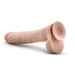 Large realistic beige dildo on a white background
