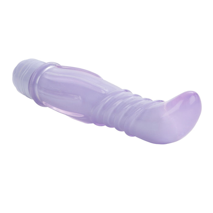 Side view of a purple vibrator with jelly sleeve on a white background