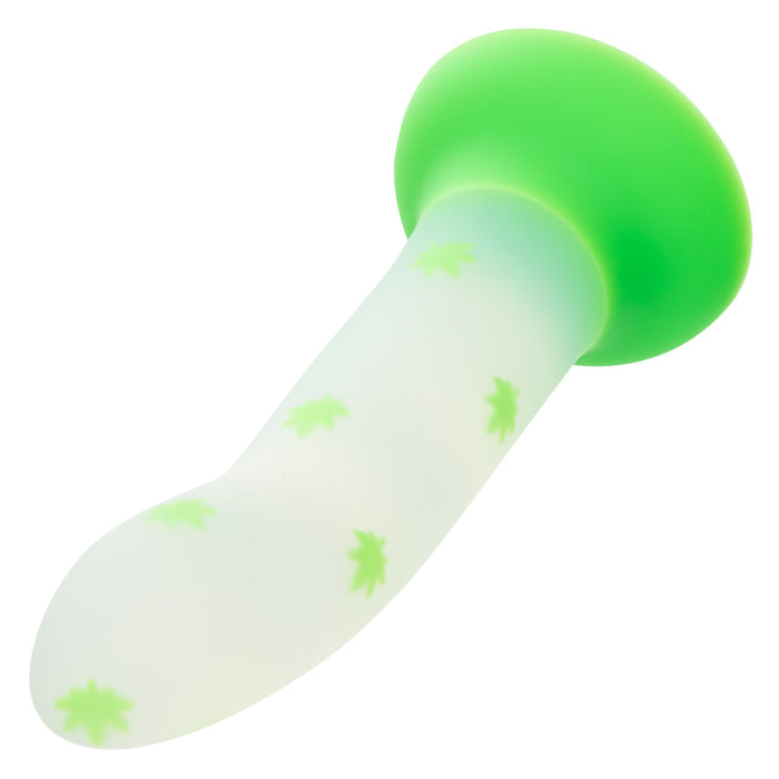 White silicone dildo with green leaf pattern and green suction cup base on a white background