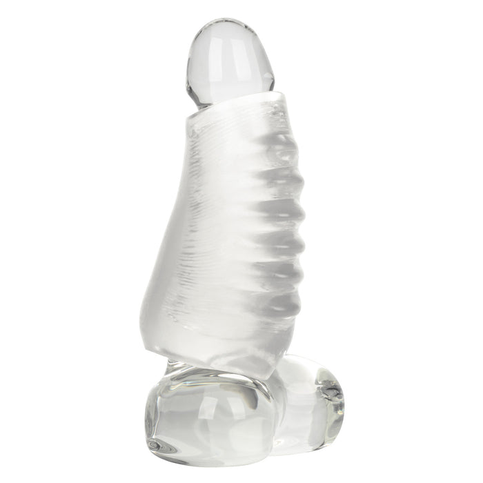 Clear ribbed rubber penis sleeve worn over a clear dildo on a white background
