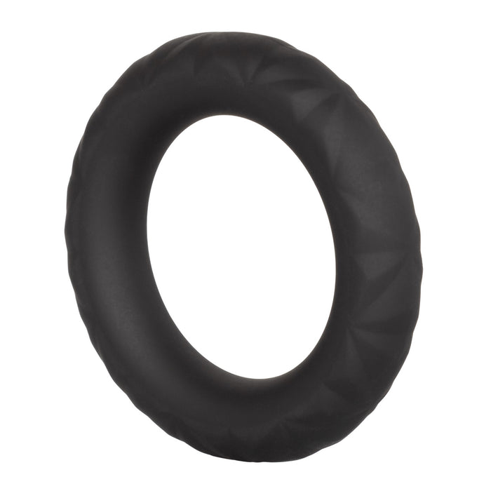 Textured black silicone ring on a white background