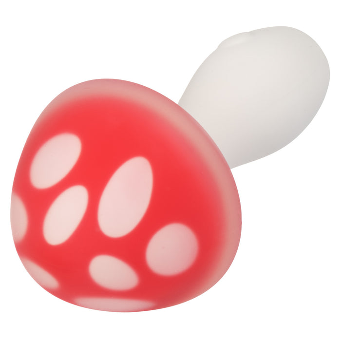 Top view of Muff Shroom red and white mushroom-shaped vibrator