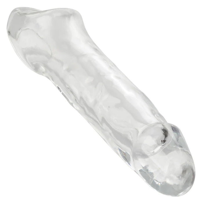 Clear penis sleeve with scrotum strap on a white background
