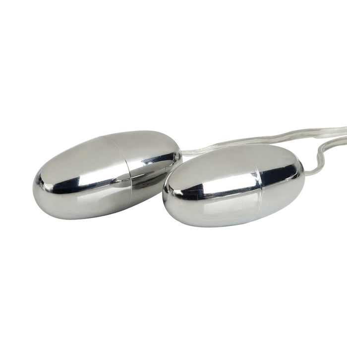 Two wired silver bullet vibrators.