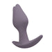 Purple silicone butt plug on a white background