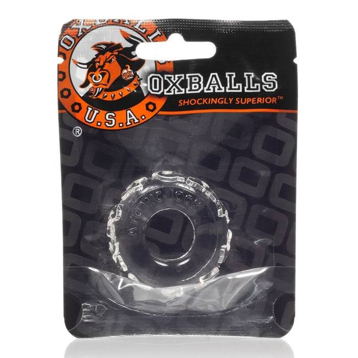 Plastic packaging with Oxballs branding containing a clear textured cock ring