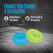 Two silicone rings, one blue and one green, on a bed with promotional text about enhancing stamina and satisfaction.
