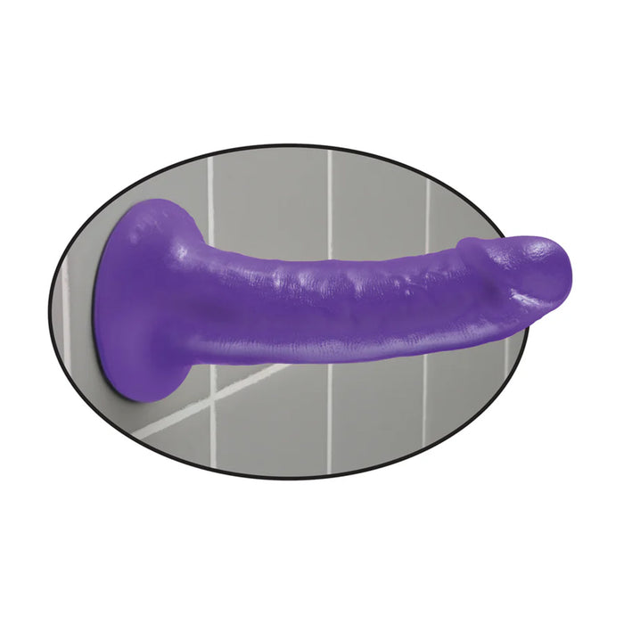 Purple Dillio 6 inch dildo attached to wall with suction cup