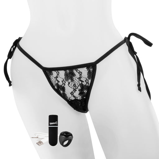 Mannequin wearing black lace panty with vibrating bullet, remote, and charge cable in the foreground