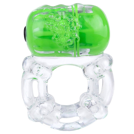 Clear textured TPE cock ring holding a green vibrating bullet on a white background