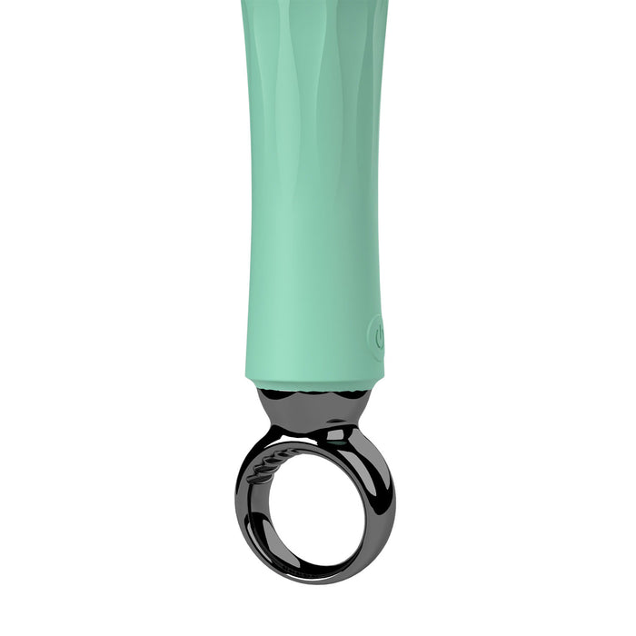 A close-up of a mint green textured handle with a glossy black ring-shaped end, shown against a plain white background.
