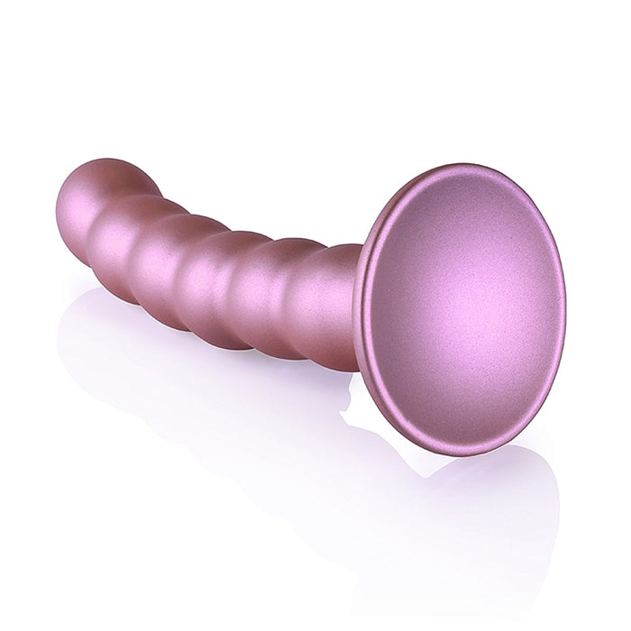 Pink beaded dildo with suction cup base on a white background