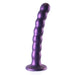 Purple beaded dildo with suction cup base on a white background
