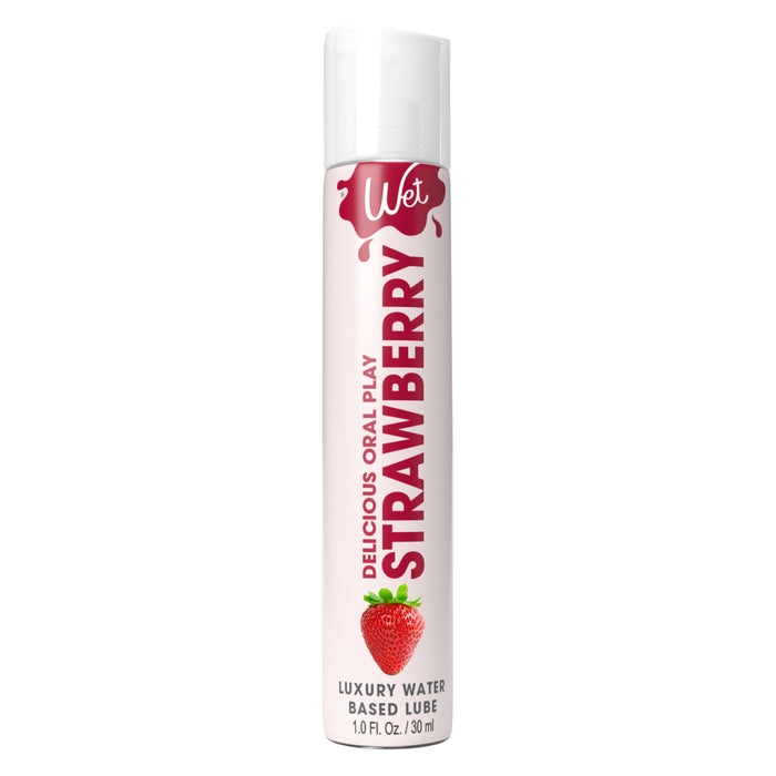 A 1 oz bottle of Wet Lubricant with 'Delicious Oral Play Strawberry' text on a white background