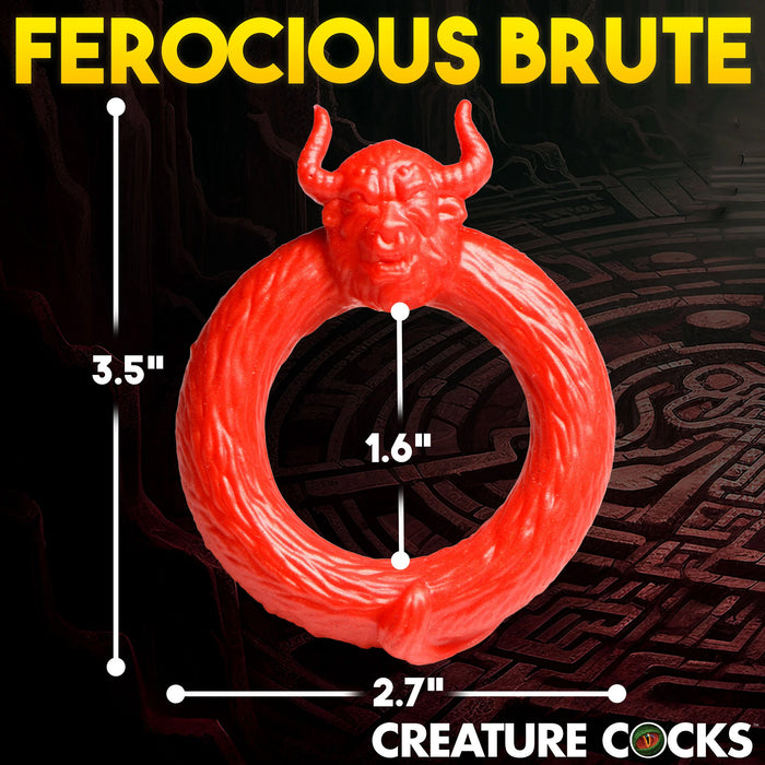 Red ring with bull head design and measurements on a dark background, featuring the brand 'Creature Cocks'.