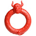 Red bull-shaped cock ring on a white background